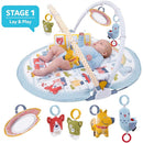 Yookidoo Baby Gym Lay to Sit-Up Playmat with a baby playing on a colorful activity mat, featuring dangling toys and a mirror.