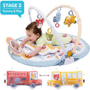 Baby playing on Yookidoo Baby Gym Lay to Sit-Up Playmat with colorful hanging toys and mirror, designed for tummy time.