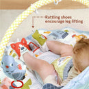 Yookidoo Baby Gym Lay to Sit-Up Playmat features a baby with rattling shoes and colorful toys, promoting leg lifting and play.