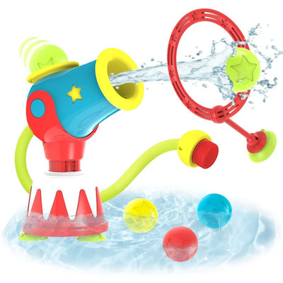 Colorful Yookidoo Ball Blaster Water Cannon with a hose, splashing water, and colorful balls in a pool setting.