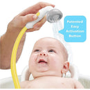 Yookidoo Elephant Baby Shower in yellow sprays water from a handheld showerhead while a smiling baby enjoys bath time.