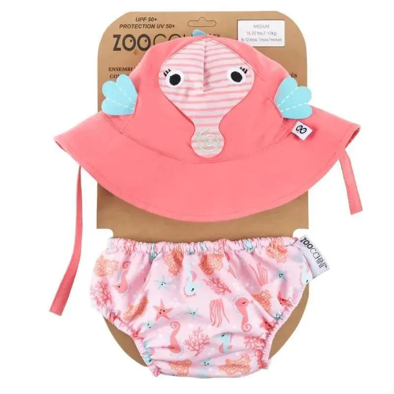 Baby swim diaper and sun hat set featuring a pink seahorse-themed hat with straps and a matching diaper adorned with sea creatures.
