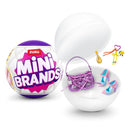 ZURU Mini Brands Fashion Series 4 capsule, featuring a purple handbag, pink high heels, and colorful accessories.