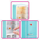 Miniature turquoise fridge playset with food items inside, including a drink can and dessert, showcasing interactive features.